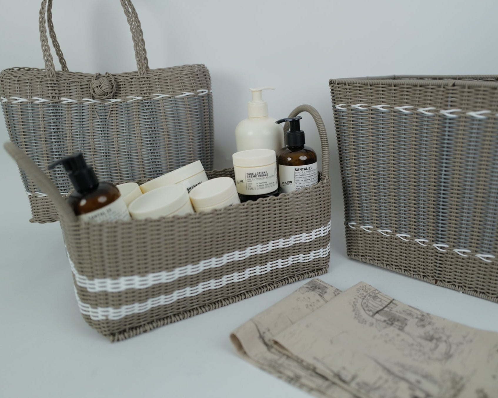 Lilley Line Wicker baskets with skincare products on a white background